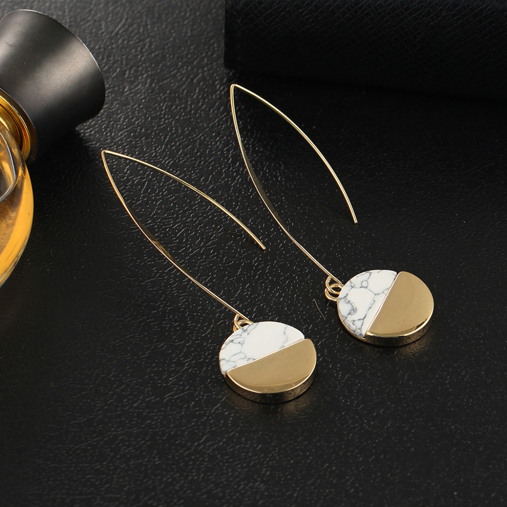 White marble circle drop earrings.